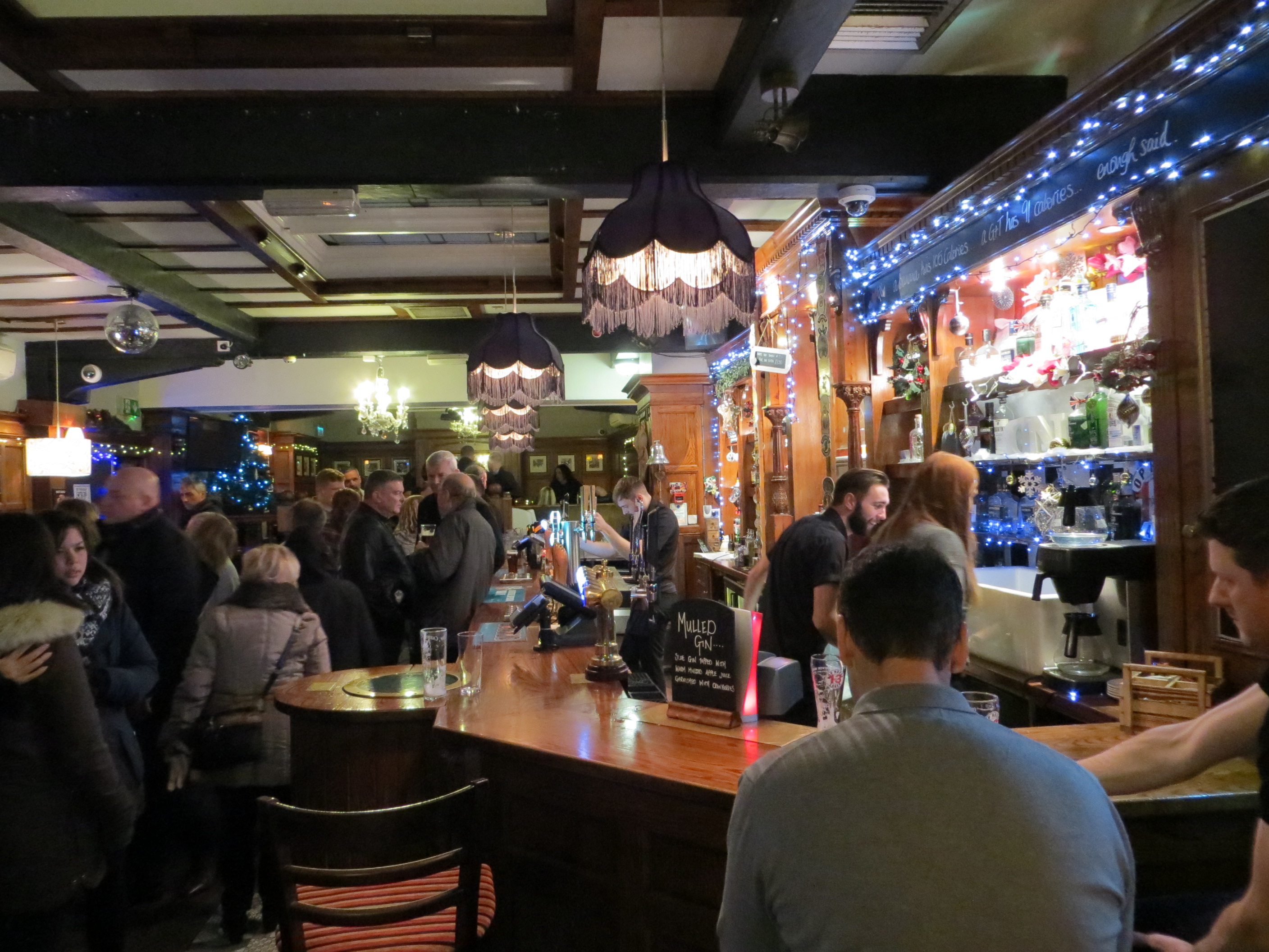 Flynn's Room bar at The Bell Inn, warm lighting, perfect for networking events.
