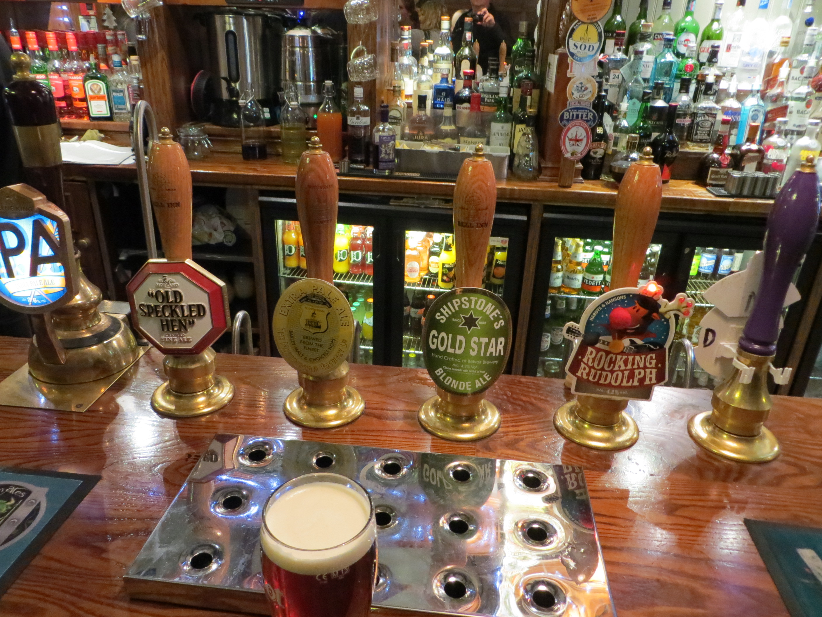 Vibrant bar with unique beer taps at Flynn's Room, ideal for networking events.