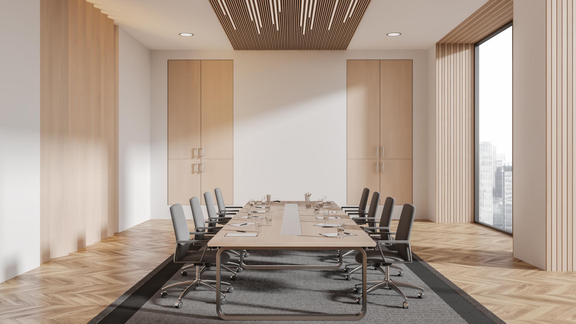 Modern conference room at Palais Nottingham, featuring a sleek wooden table for professional events.