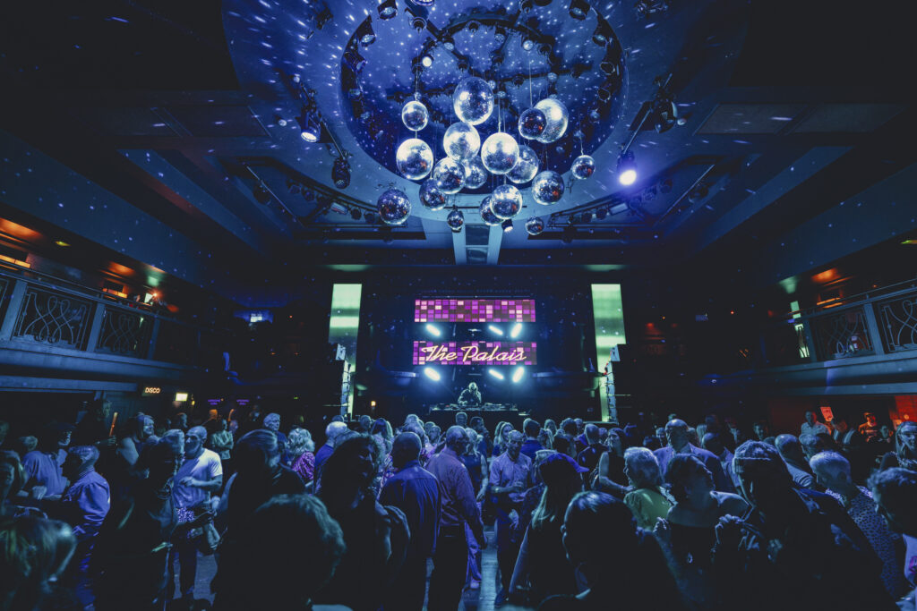 Vibrant event space in Palais Nottingham with dynamic lighting for live performances.