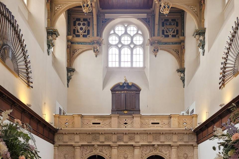 Great Hall at Wollaton Hall, vaulted ceilings, elegant event space for upscale gatherings.