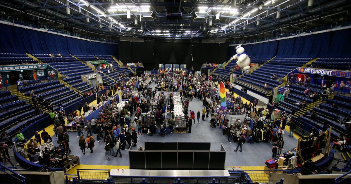Vibrant event setup in Main Arena, Motorpoint Arena Nottingham for networking and displays.