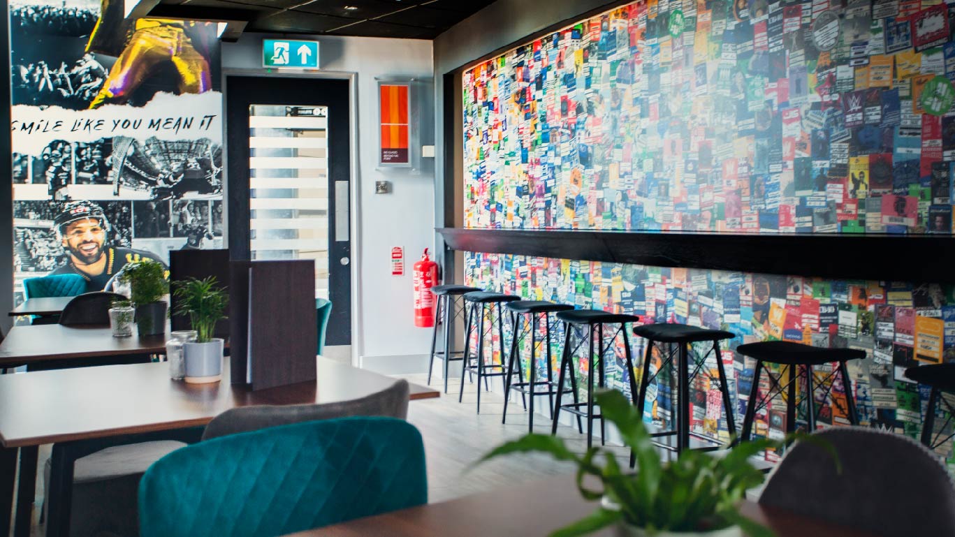 Modern meeting space at Bar 1946, Motorpoint Arena Nottingham; vibrant decor for creative events.