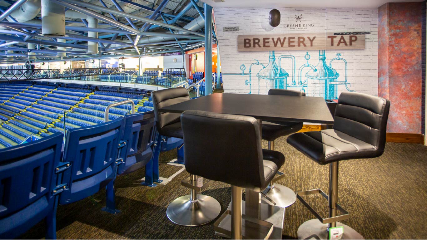 Stylish Executive Suite with sleek black furniture in Motorpoint Arena Nottingham for networking events.