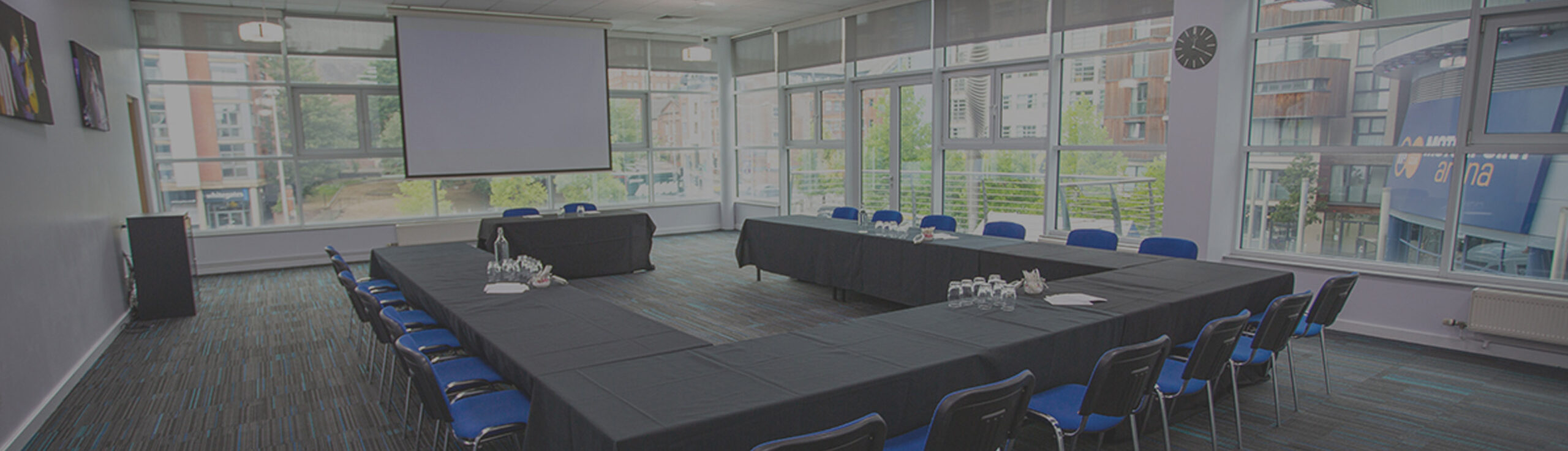 Bolero Suite meeting space at Motorpoint Arena Nottingham, U-shaped tables, bright atmosphere.