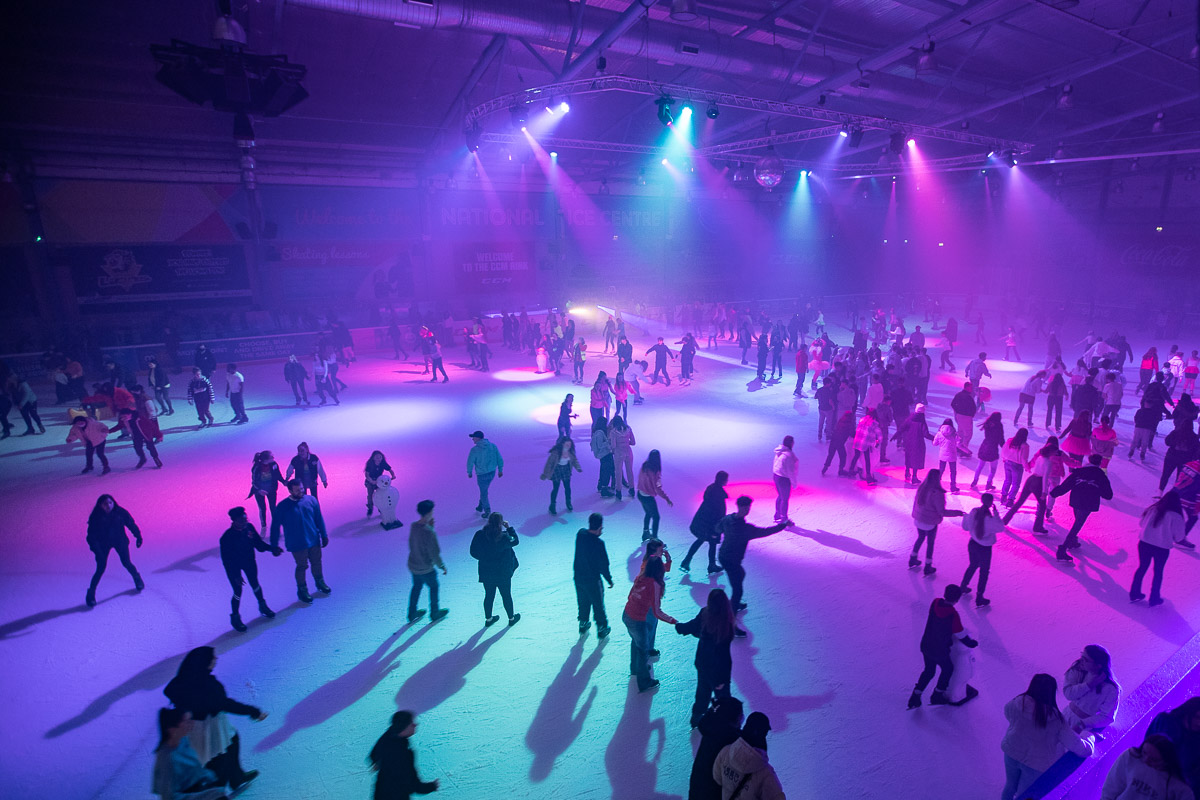 "Vibrant ice skating rink at National Ice Centre, ideal for corporate events and gatherings."
