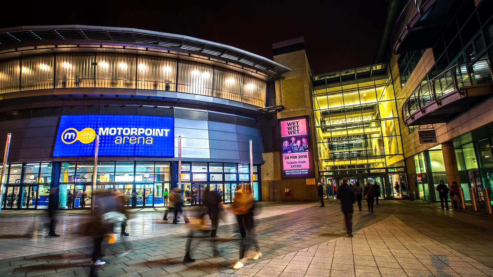Motorpoint Arena Nottingham entrance at night, vibrant venue for events and meetings.