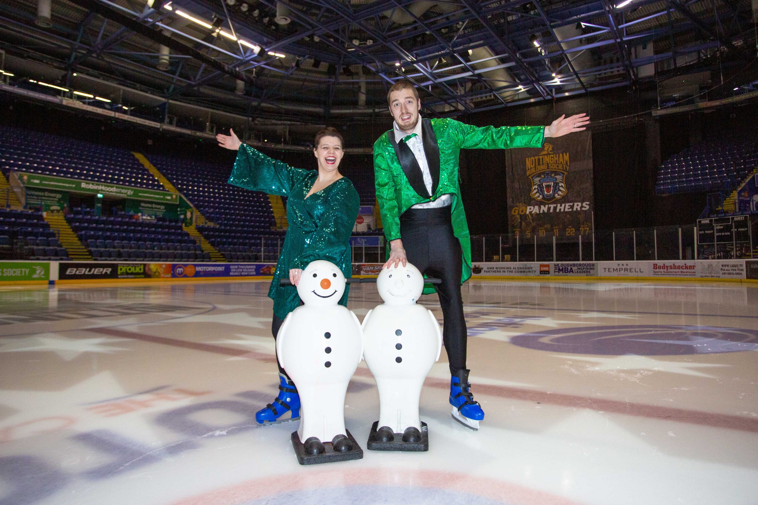 "Festive ice performers at National Ice Centre for holiday events and entertainment."