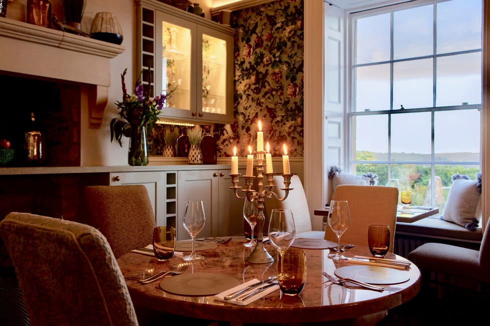 Oak Room private dining space with warm ambiance for executive retreats and networking dinners.