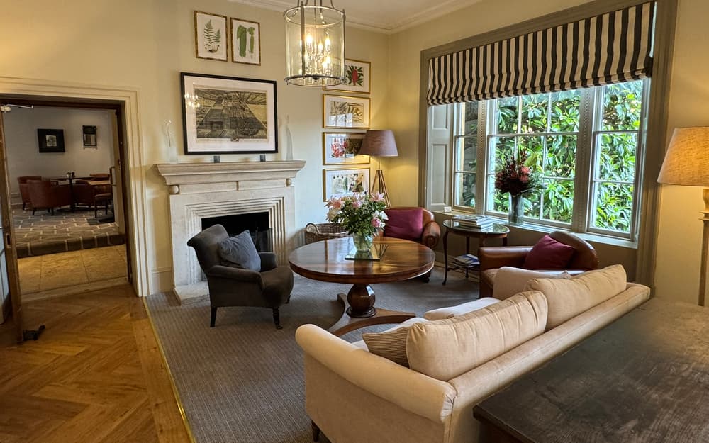 Montrose Suite lounge at Cotswold House Hotel, elegant decor for networking events.
