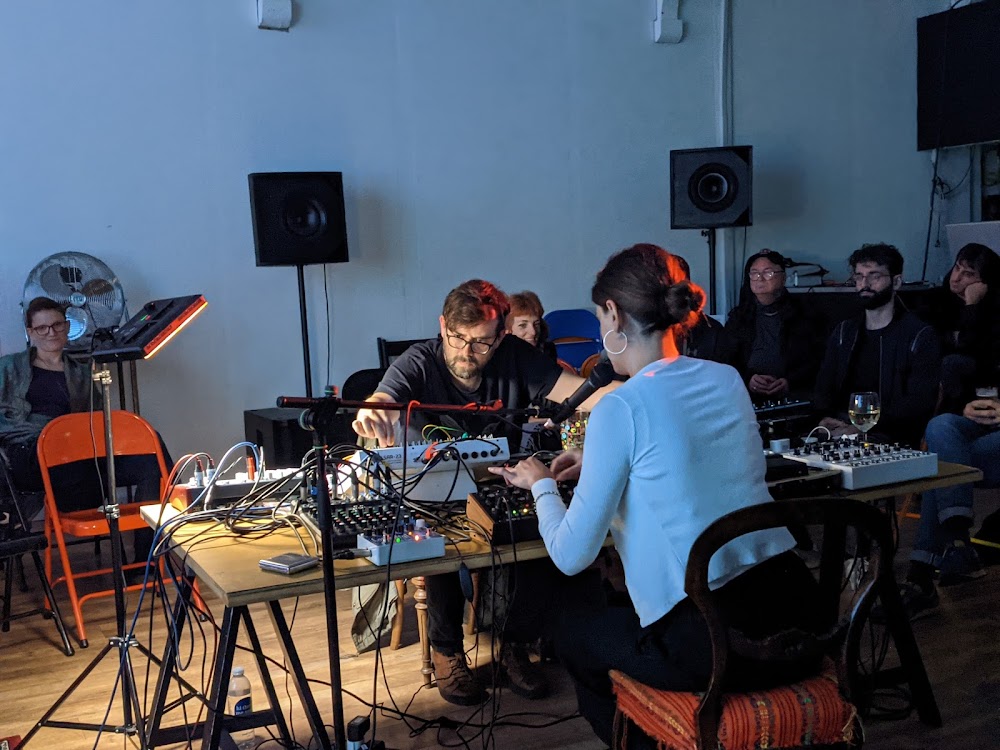 Intimate live performance setup at IKLECTIK, ideal for creative workshops and events.