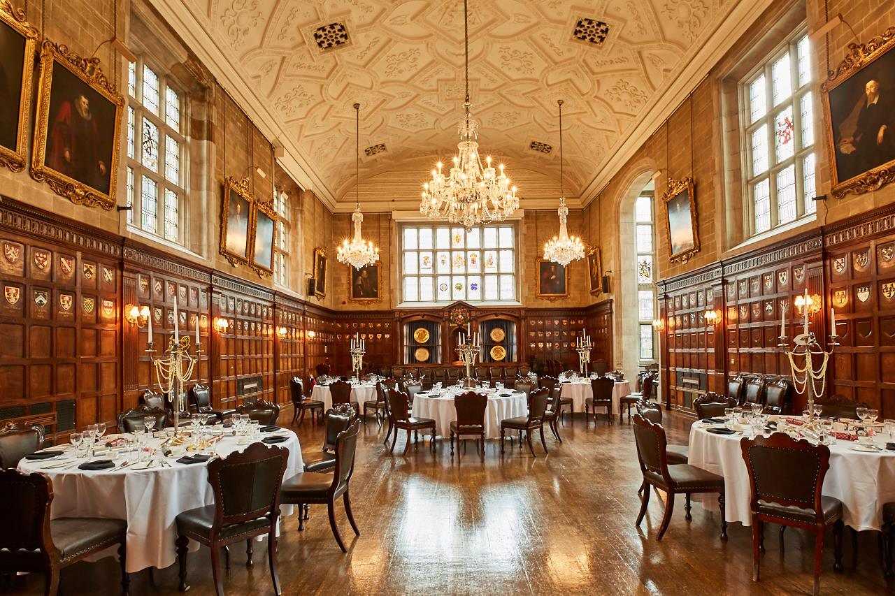Elegant banquet hall with wood paneling, perfect for upscale events and formal dinners.