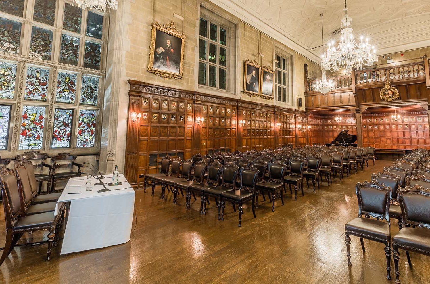 Banqueting Hall at Ironmongers' Hall with elegant paneling for a formal conference.