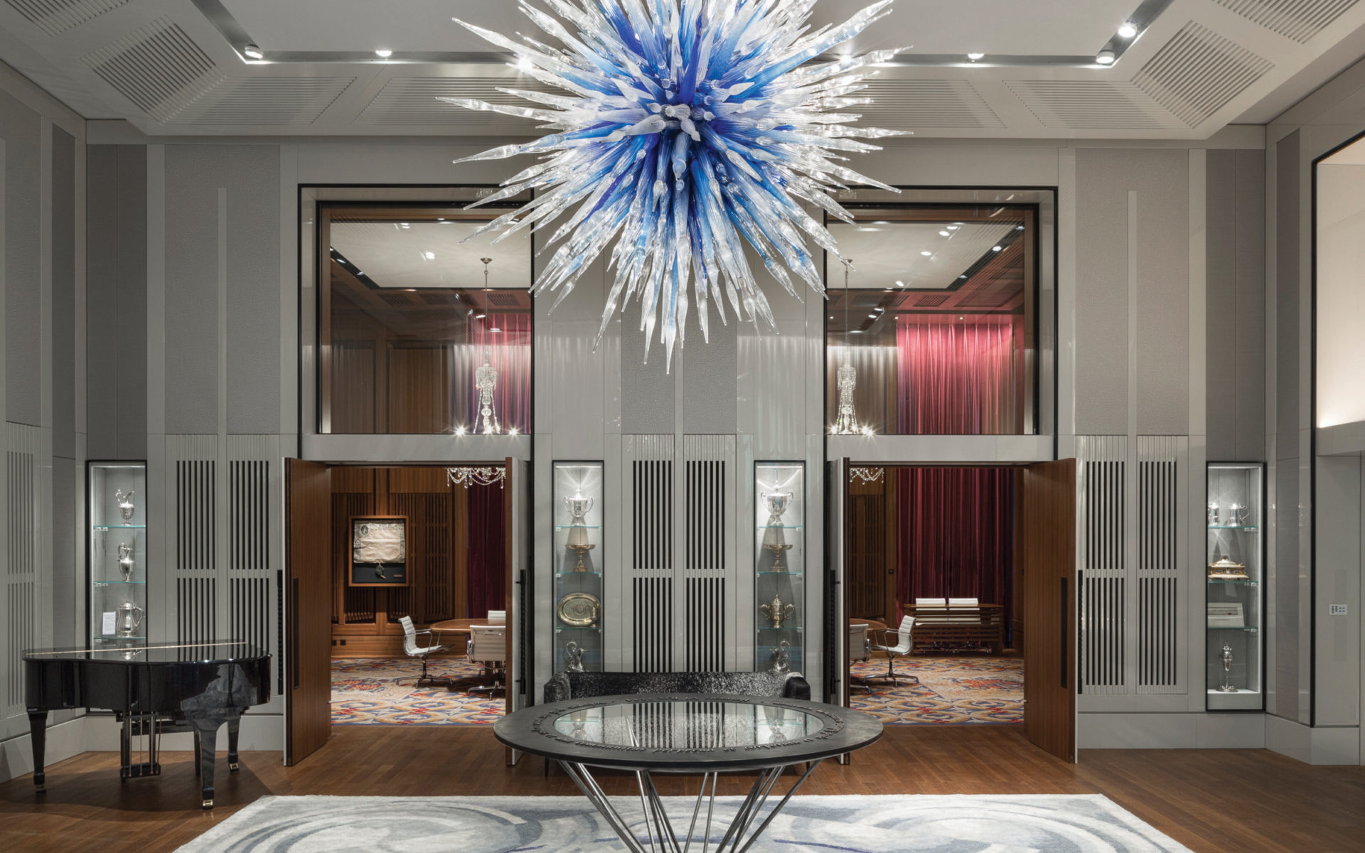 Elegant Dining Hall with modern chandelier for upscale meetings and social events.