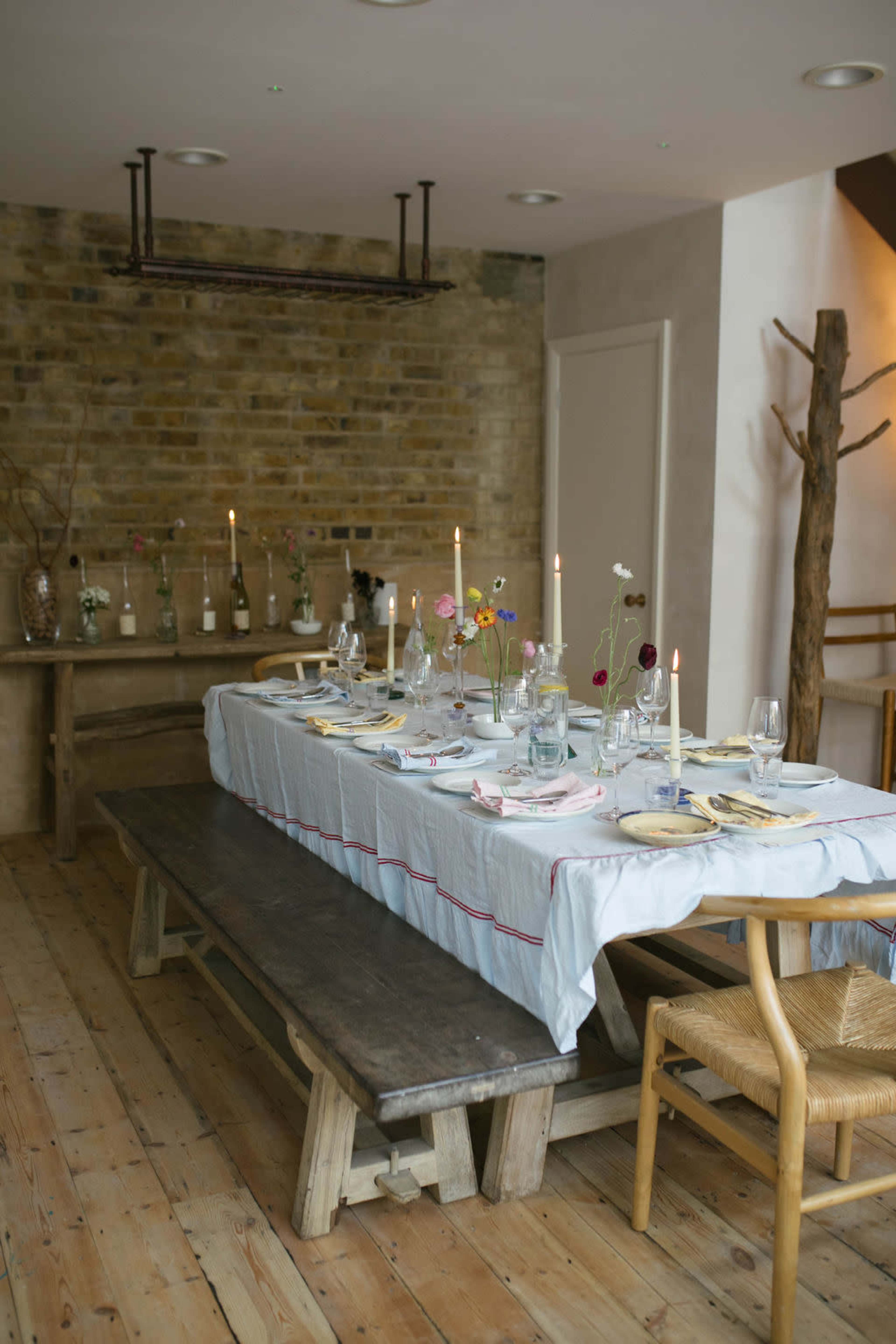 Private dining tablescape in Henley Room at The Manor of Hurst with rustic brick, intimate event.