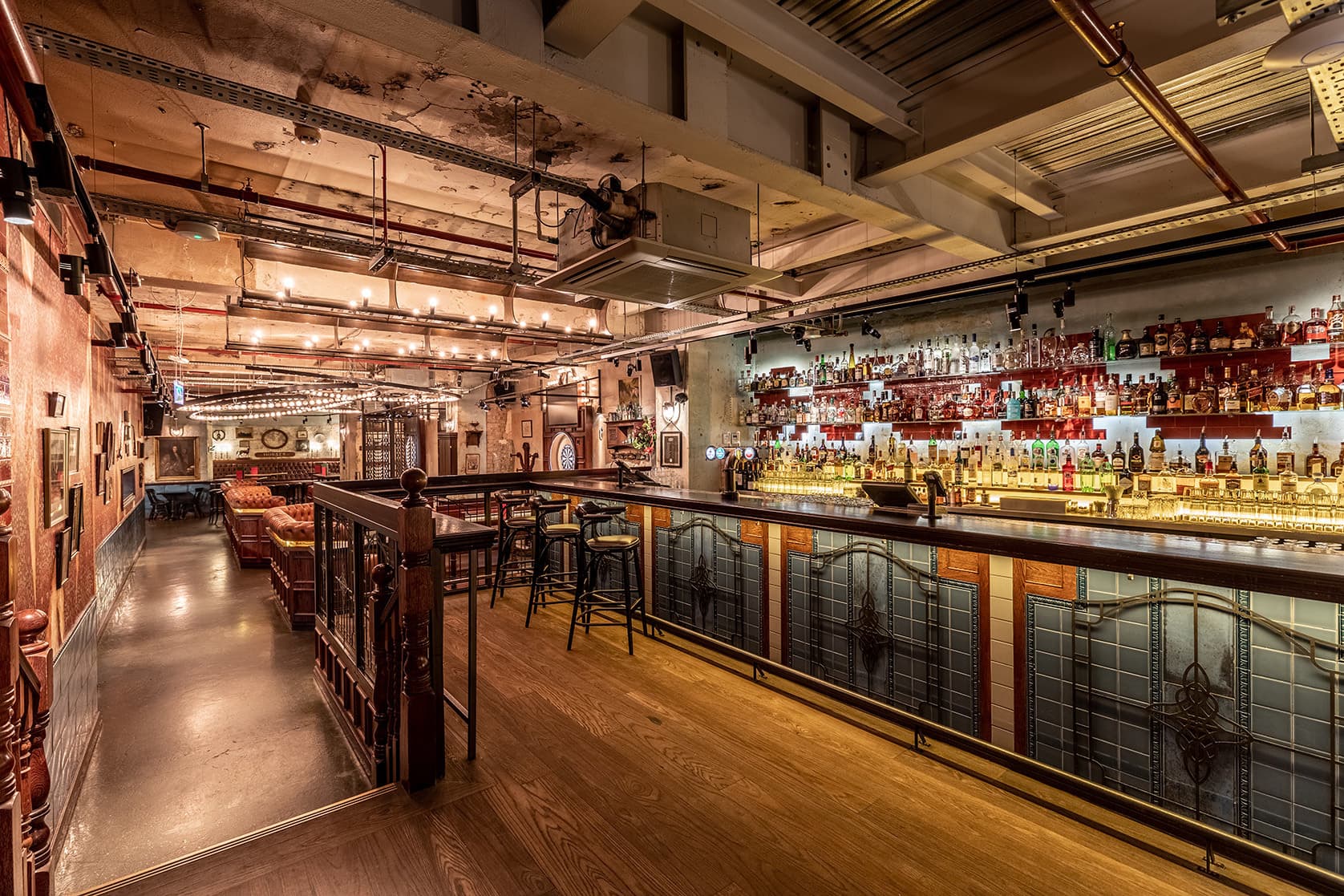 Basement Bar in Shoreditch: stylish venue with backlit bar for corporate events and gatherings.