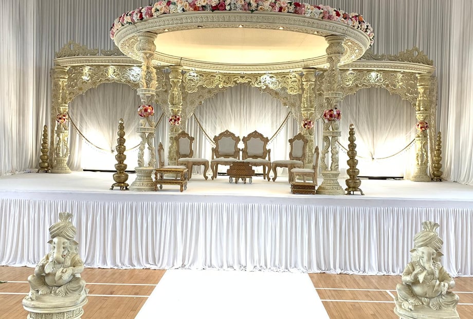 Elegant stage in Navnat Centre Dining Hall, perfect for cultural weddings and ceremonies.