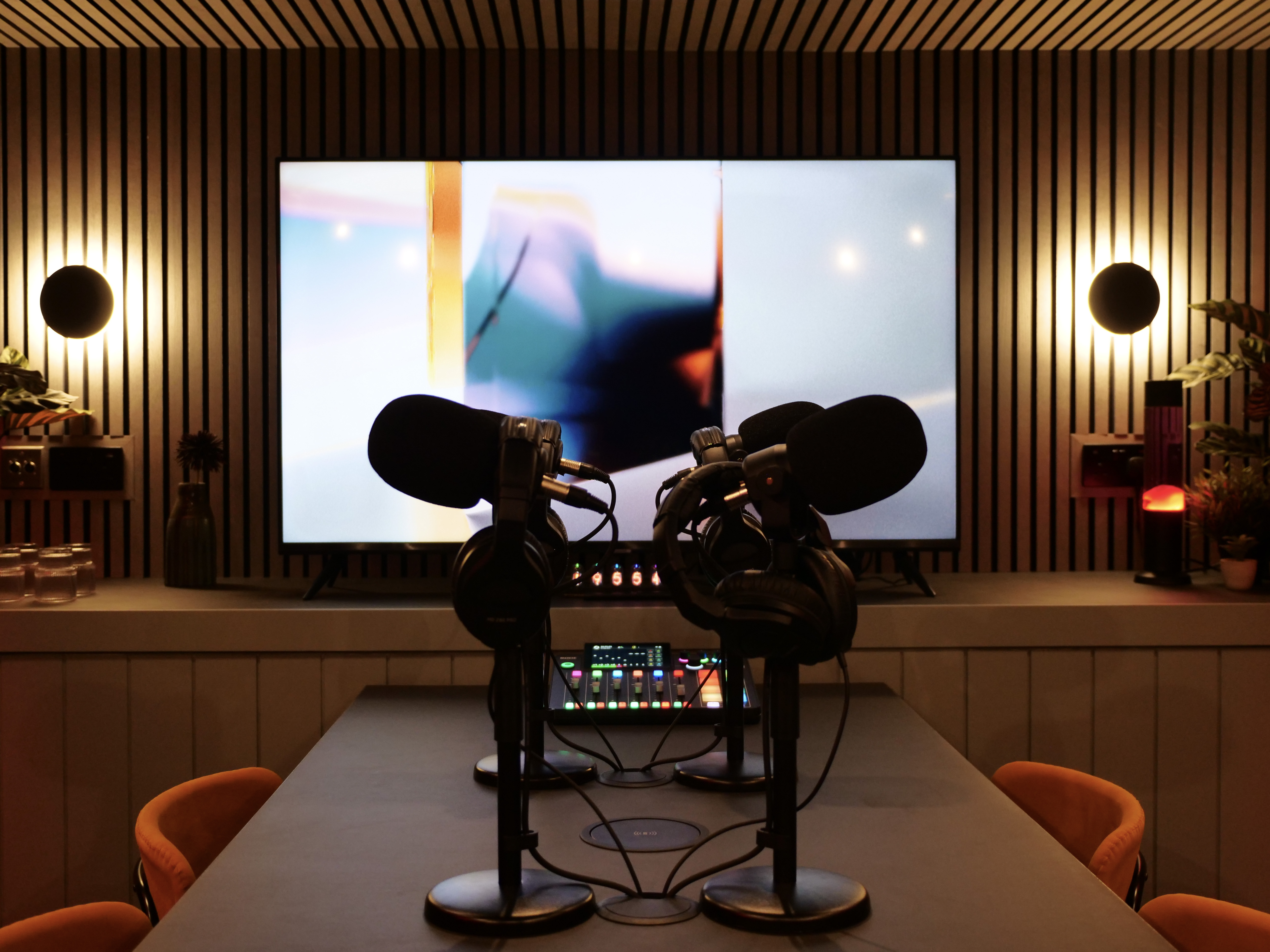 Modern podcast room with high-quality microphones for engaging virtual events.
