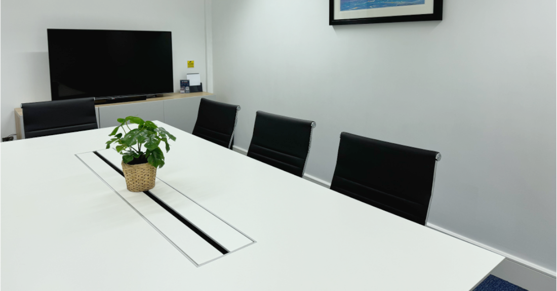 MYCO Ipswich meeting room, sleek table, presentation event