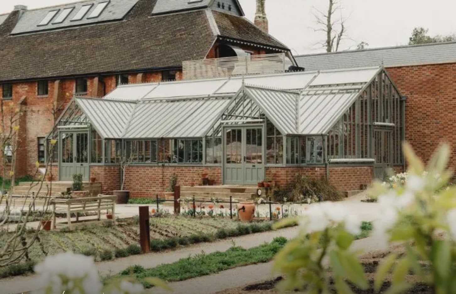 Maison Estelle greenhouse venue for elegant corporate retreats and luxury private events.