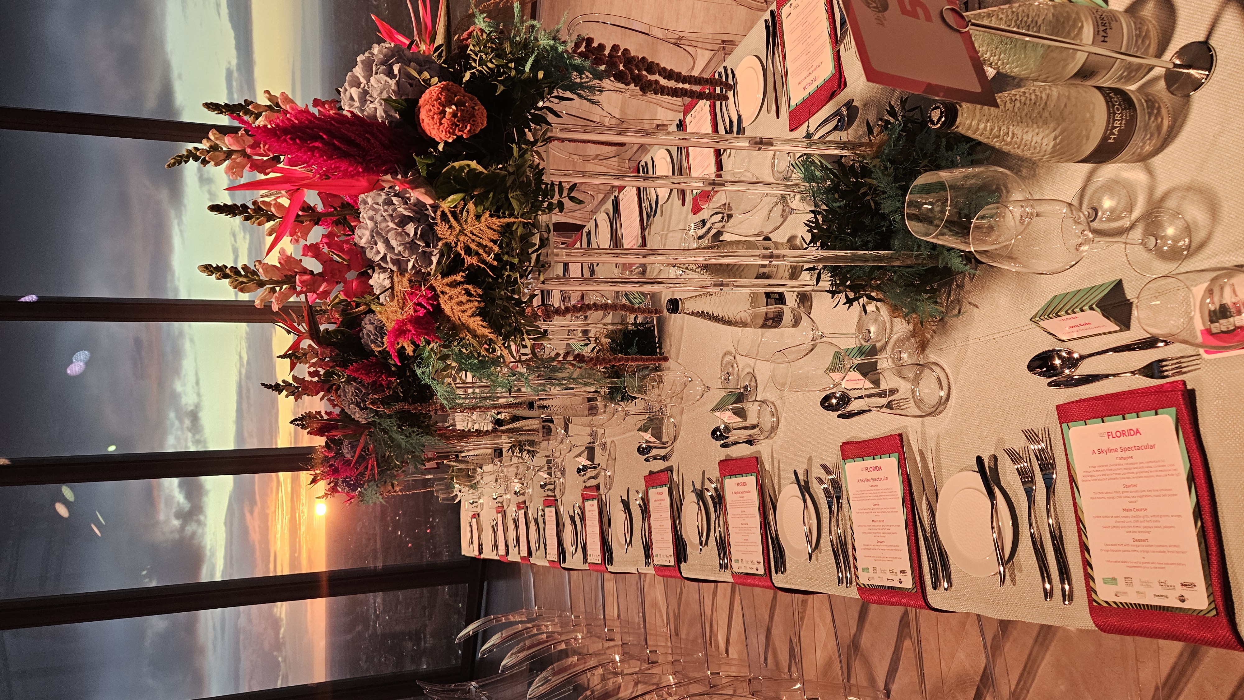 Elegant dining table, floral centerpiece, wedding, corporate event.