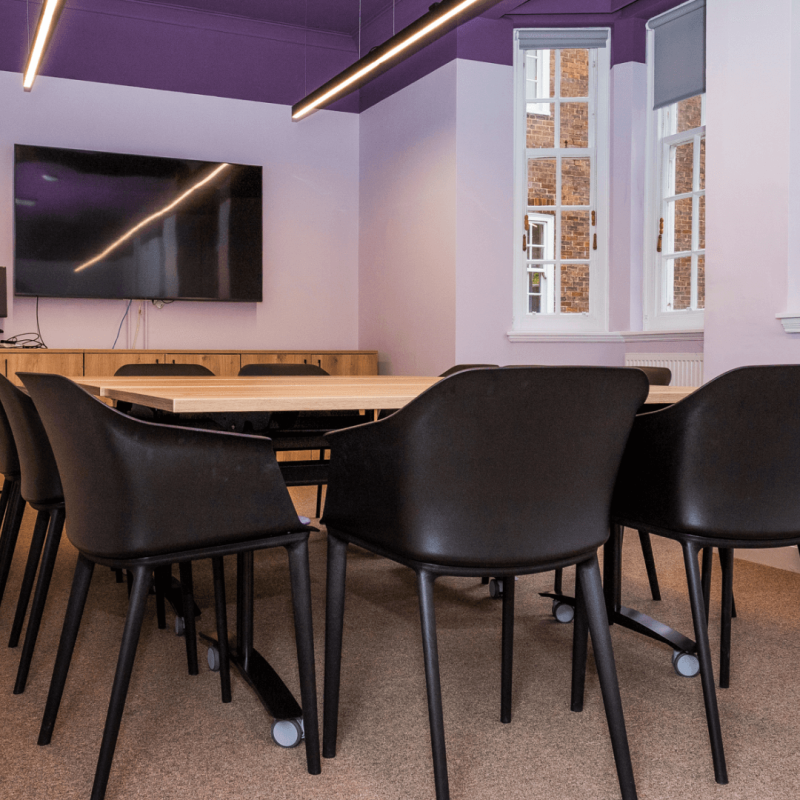 Modern Weybridge Conference Room with ergonomic chairs for productive meetings.