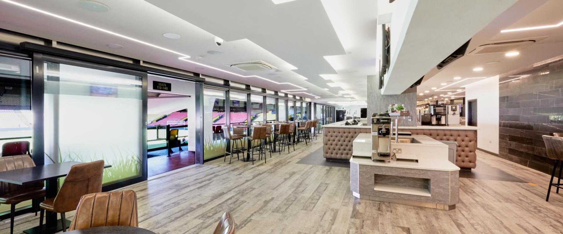 Modern event space at Watford F.C. with natural light for corporate meetings and gatherings.