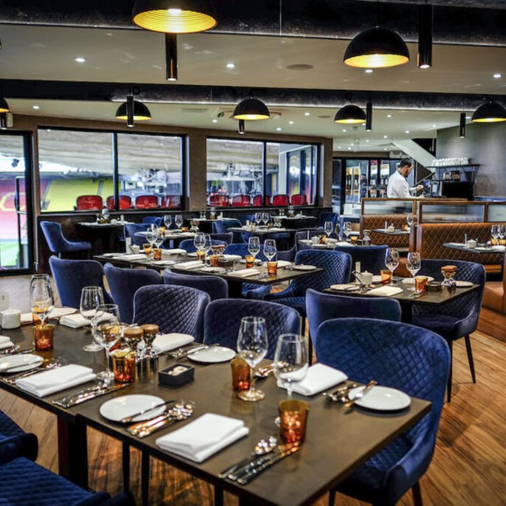 Elegant restaurant setup at Watford F.C. for corporate events and private gatherings.