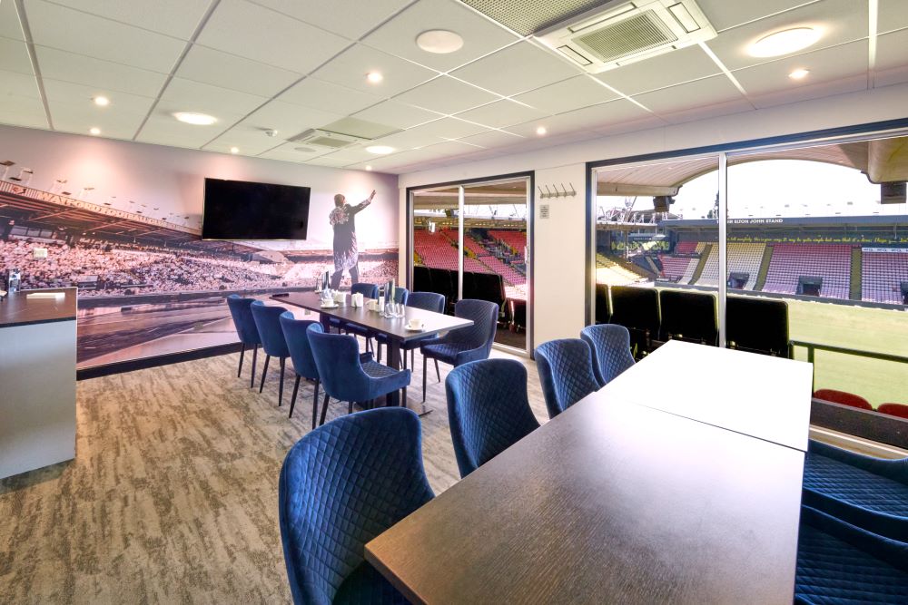 Sleek conference room with stadium view at Watford F.C. for corporate events.