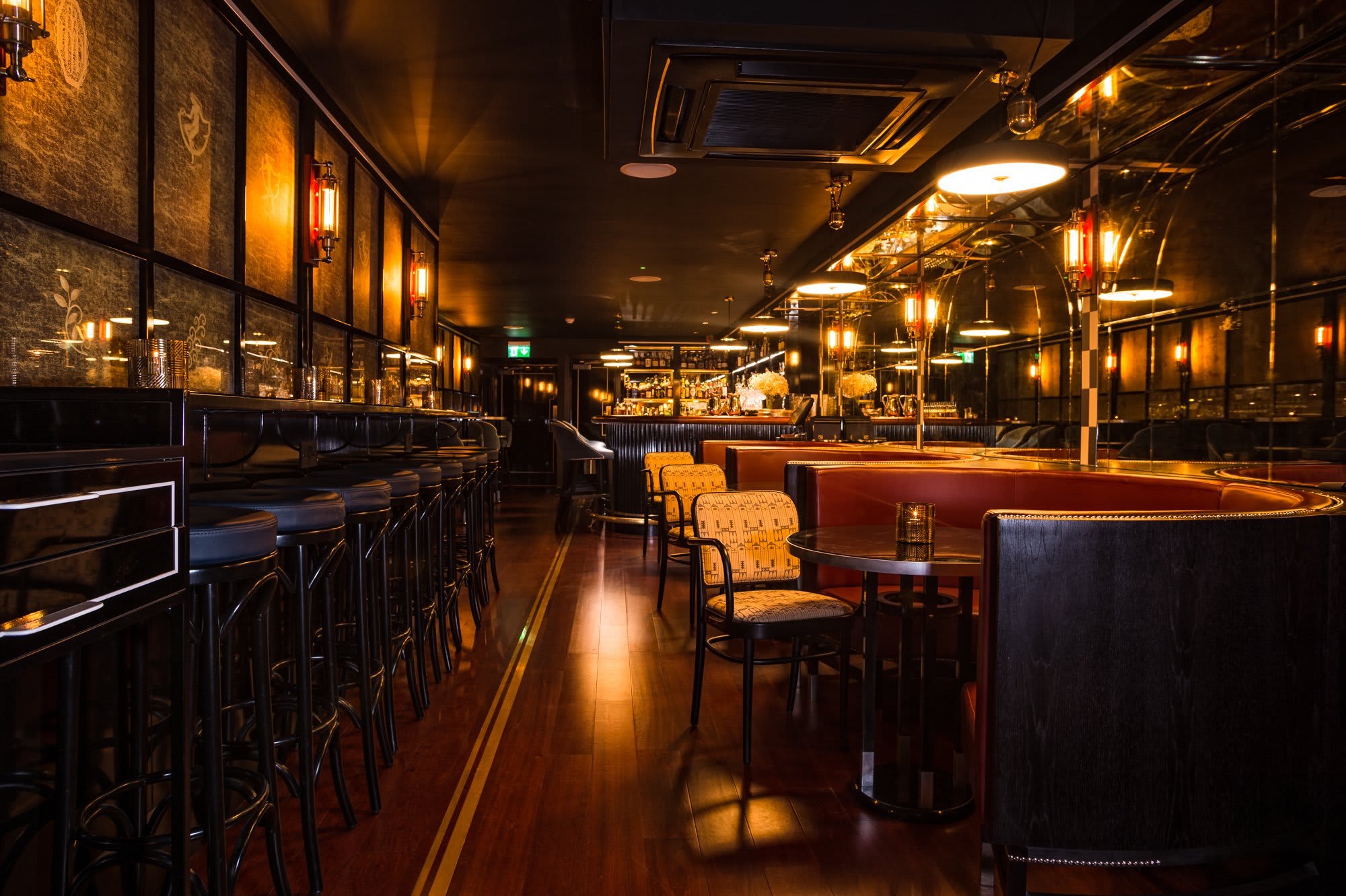 "Stylish Basement Bar in Swift Soho, perfect for intimate events with warm lighting."