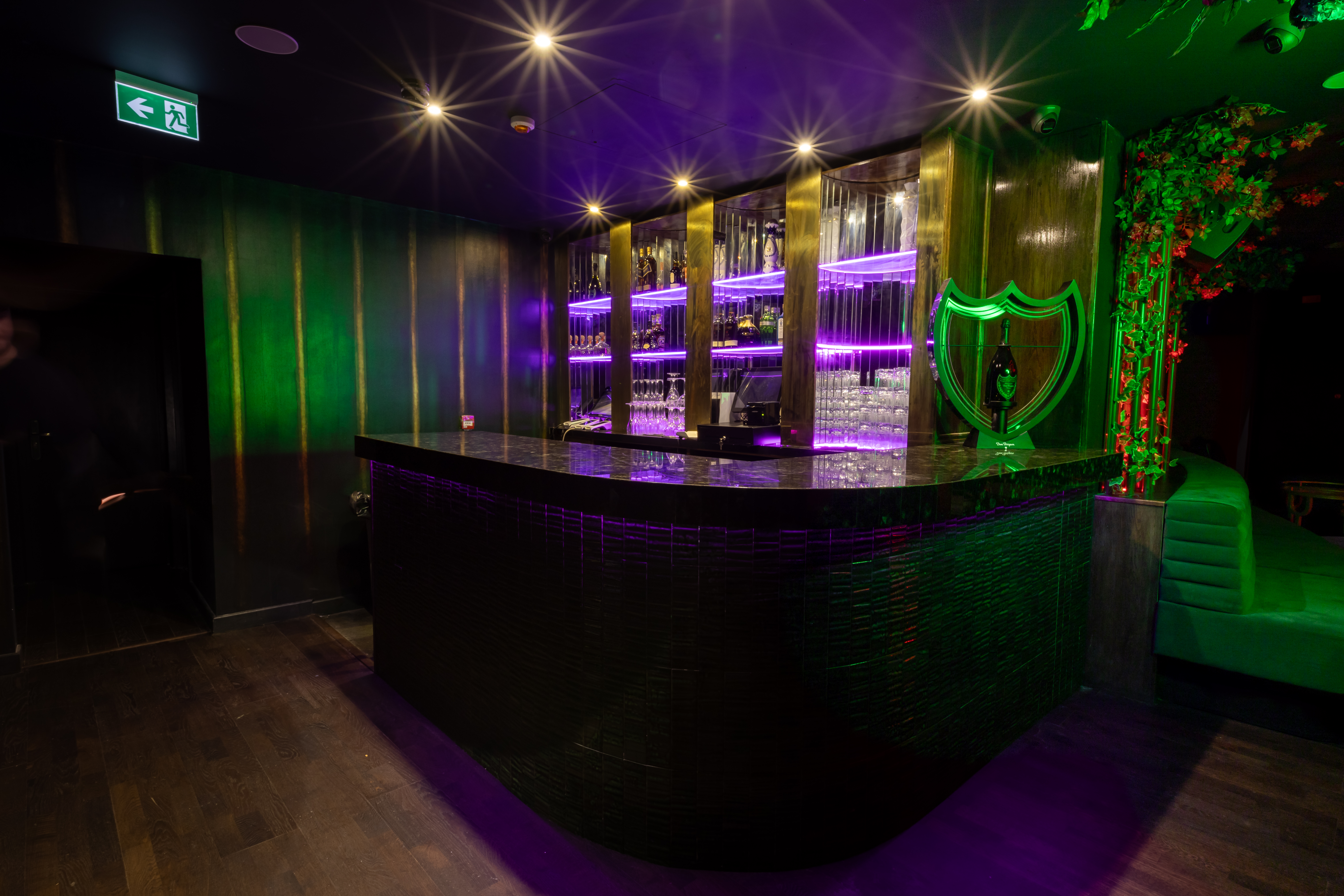 Helios Room bar at Selene Nightclub with vibrant lighting for cocktails or parties
