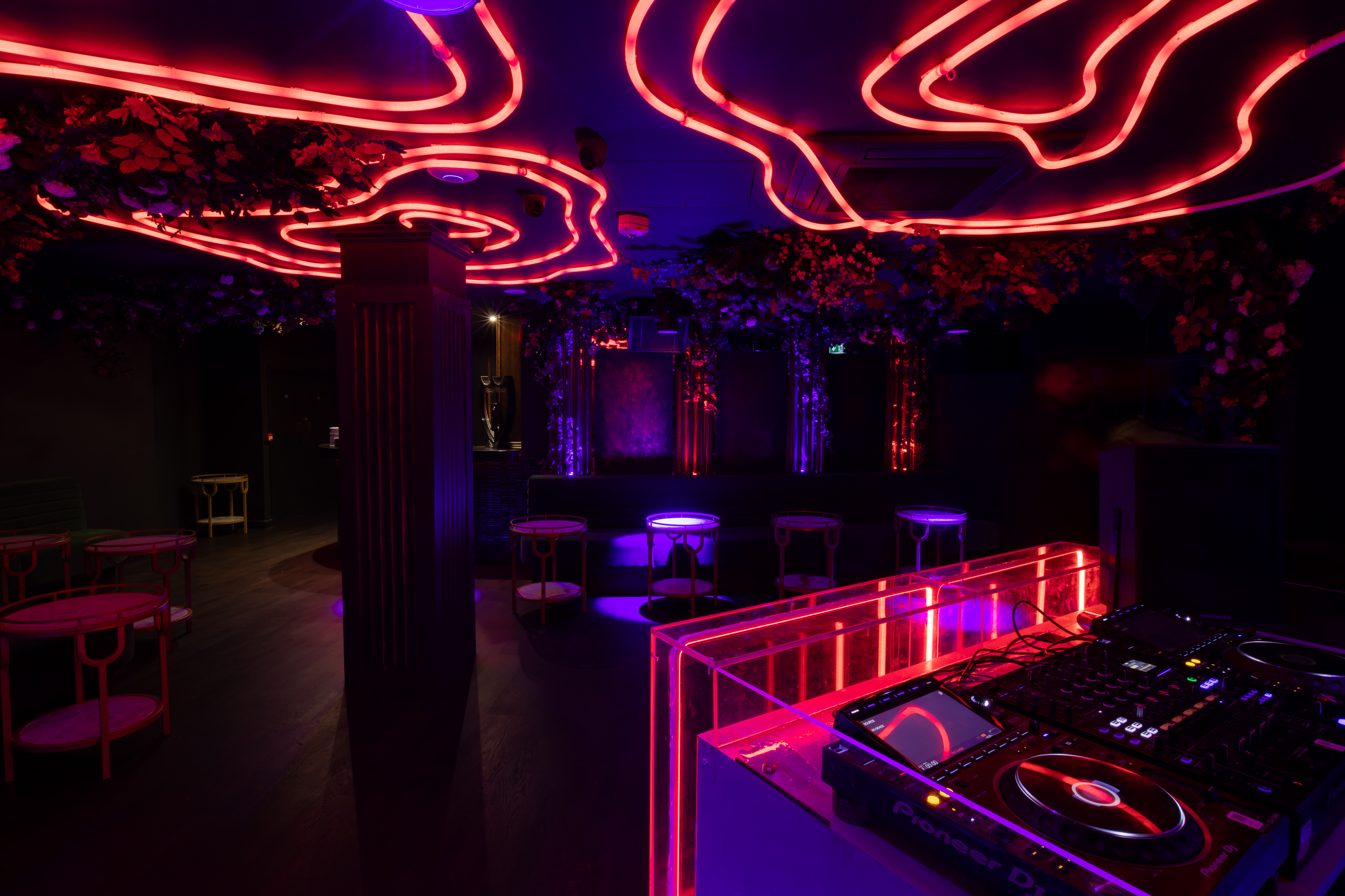 Helios Room at Selene Nightclub: vibrant neon event space for parties and corporate gatherings.