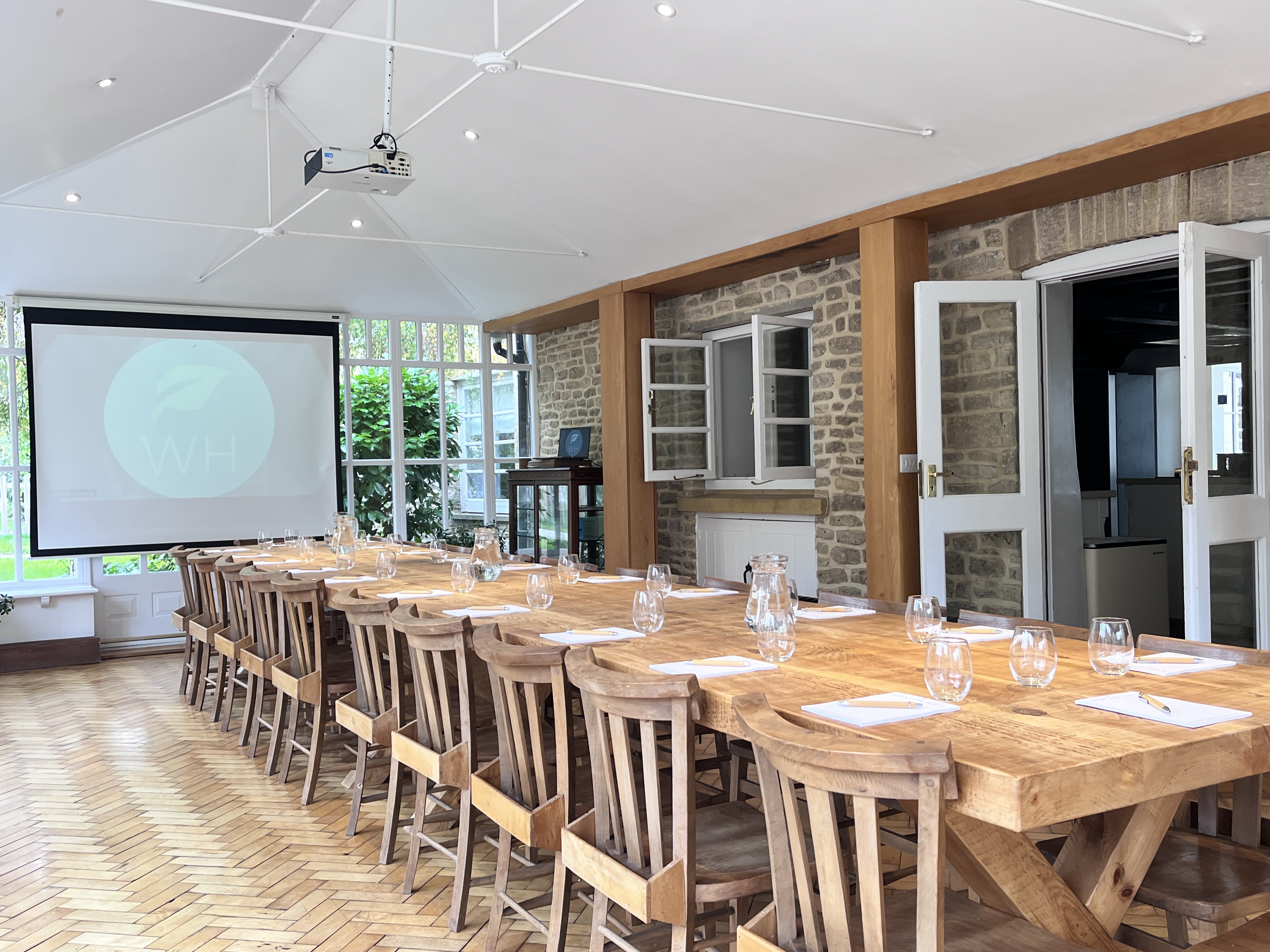 Farmhouse boardroom, stone walls, workshop, retreat