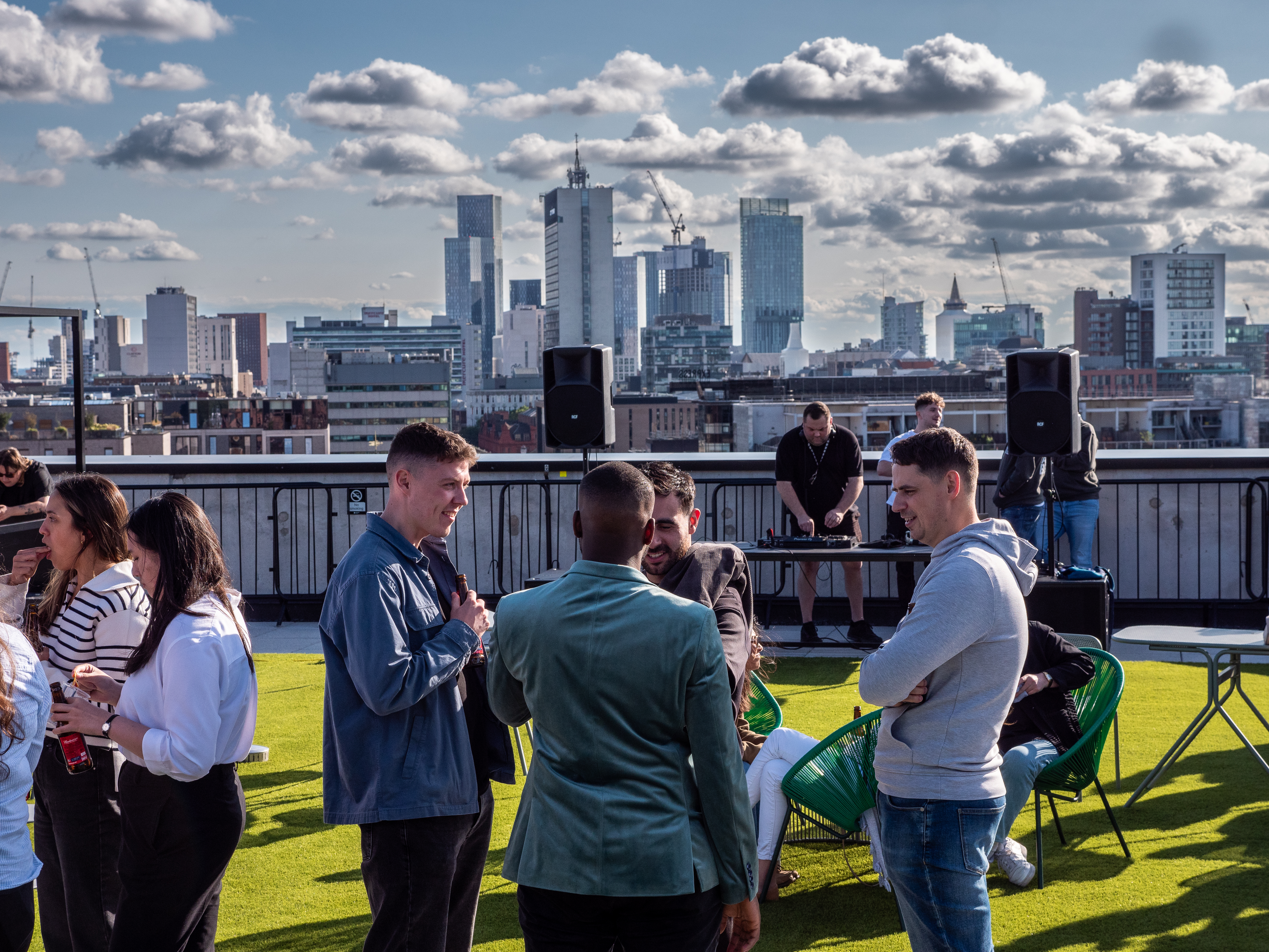 Silk Street Rooftop event with urban skyline, ideal for networking and summer gatherings.