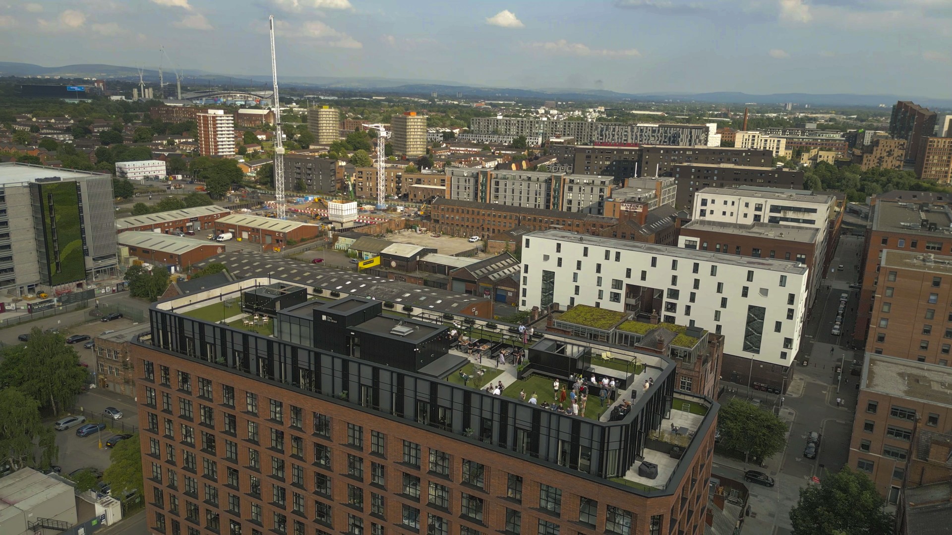 Silk Street Rooftop venue with greenery, ideal for corporate events and social gatherings.