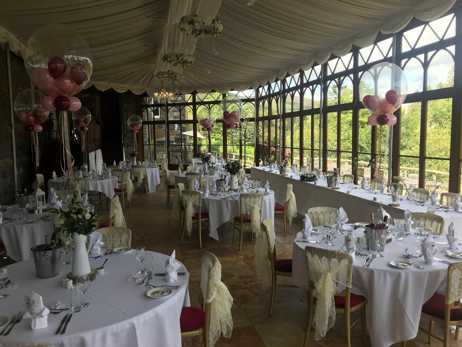 Conservatory wedding reception, bright, floral, formal event