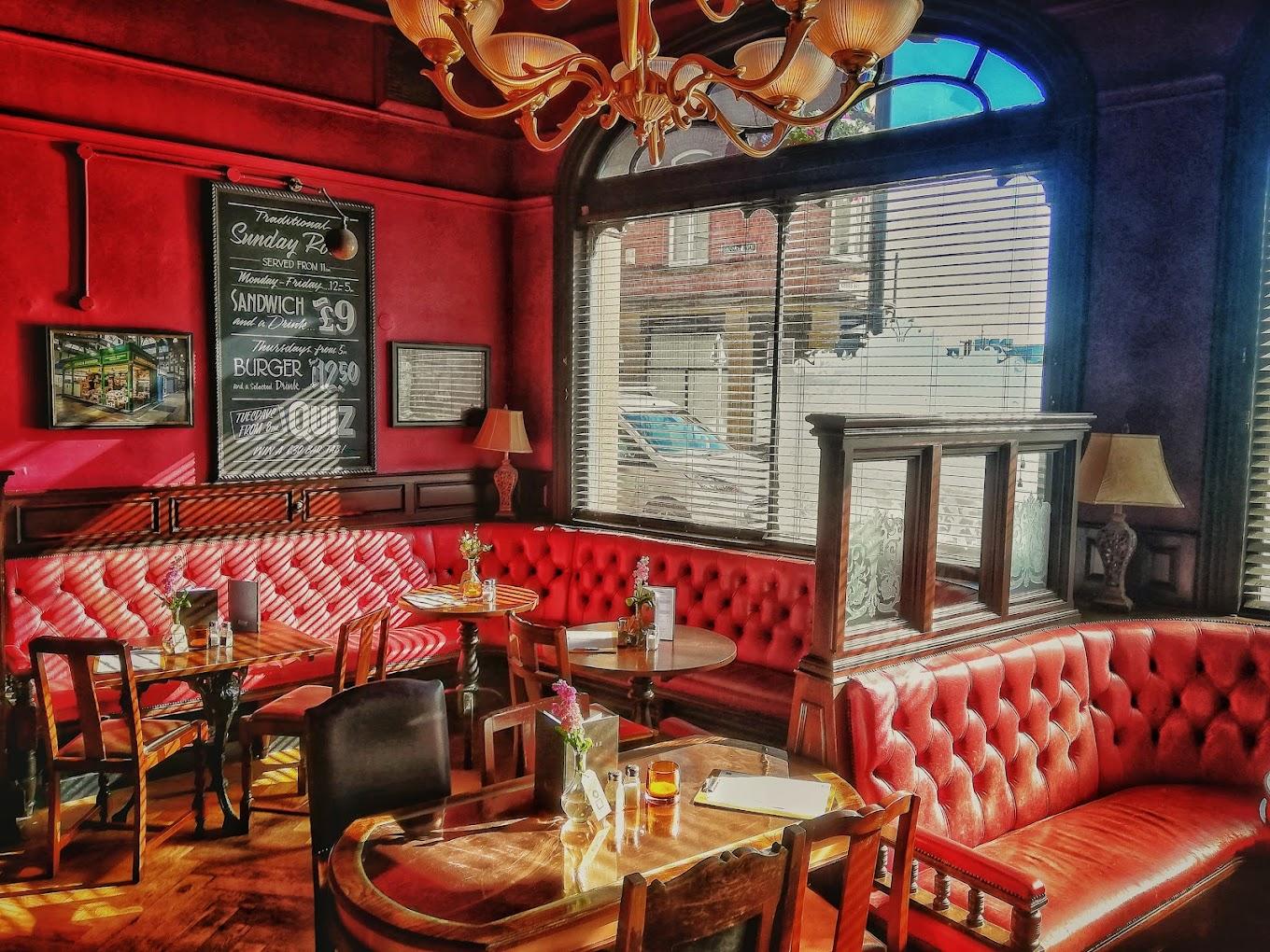 Royalty Tap Room red banquette upscale pub networking