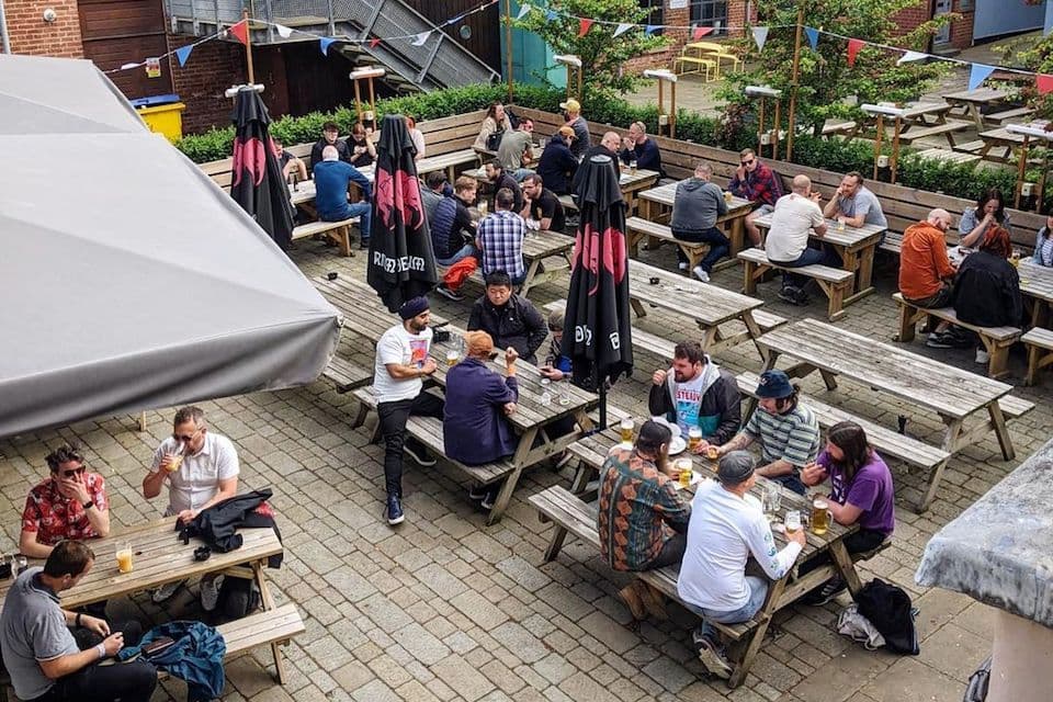 Outdoor beer garden reception, corporate event seating