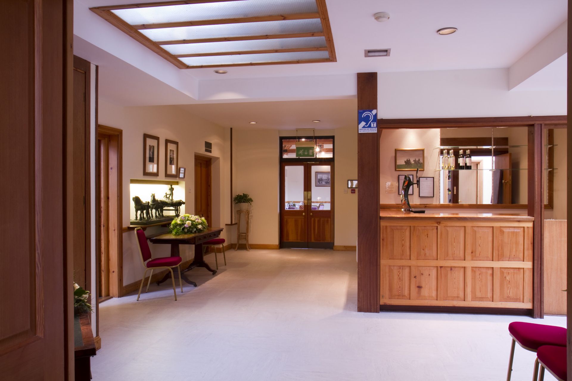 Whole Venue lobby in Loyd Lindsay Rooms, warm wood accents for meetings and events.