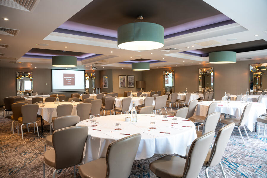 Whole Venue at Loyd Lindsay Rooms, modern event space with round tables for meetings.
