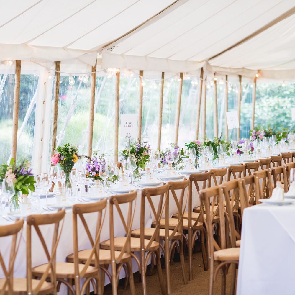 Elegant banquet setup with floral centerpieces for upscale weddings and events.