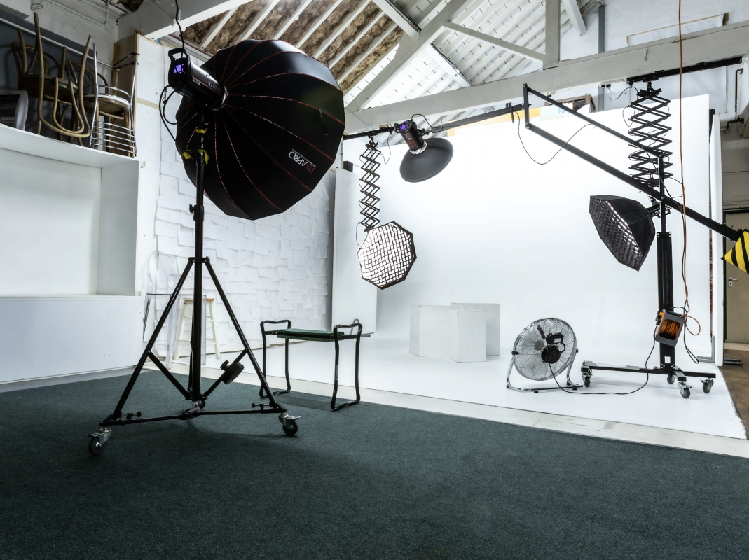 Versatile event space with professional lighting for branding and workshops.