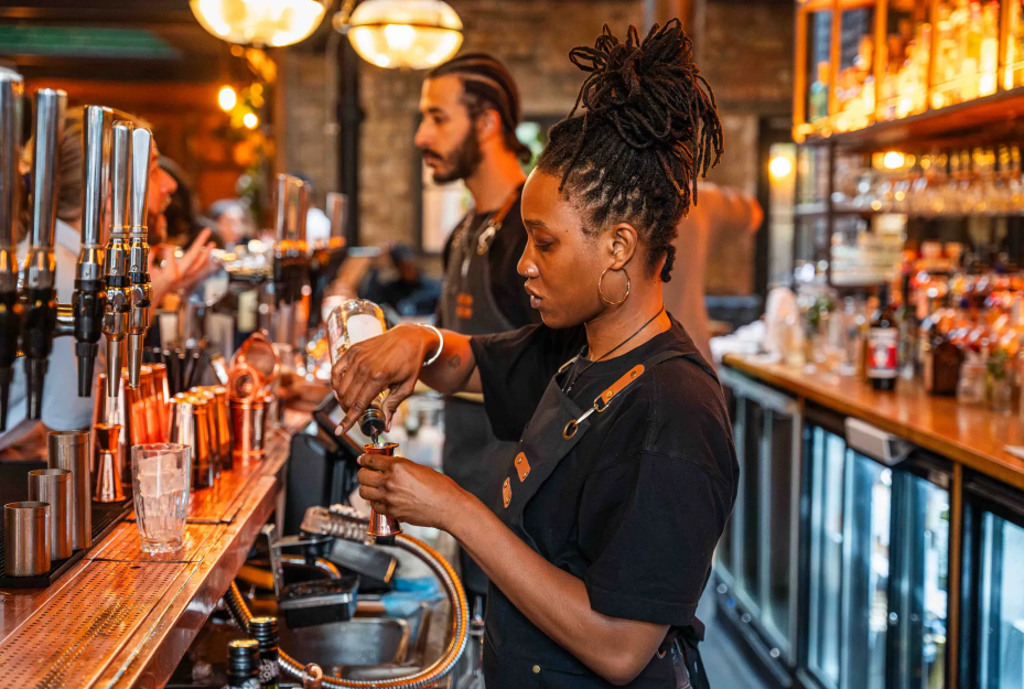 Old Street Tavern networking event, bartender, social gathering.