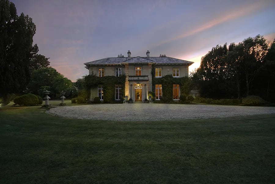 Elegant Haygrass House estate at dusk, ideal for weddings and corporate events.