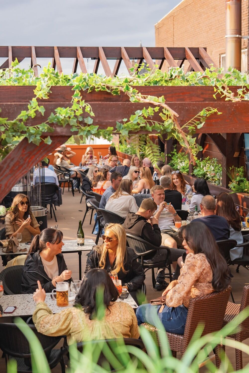 Rooftop party event, green garden bar