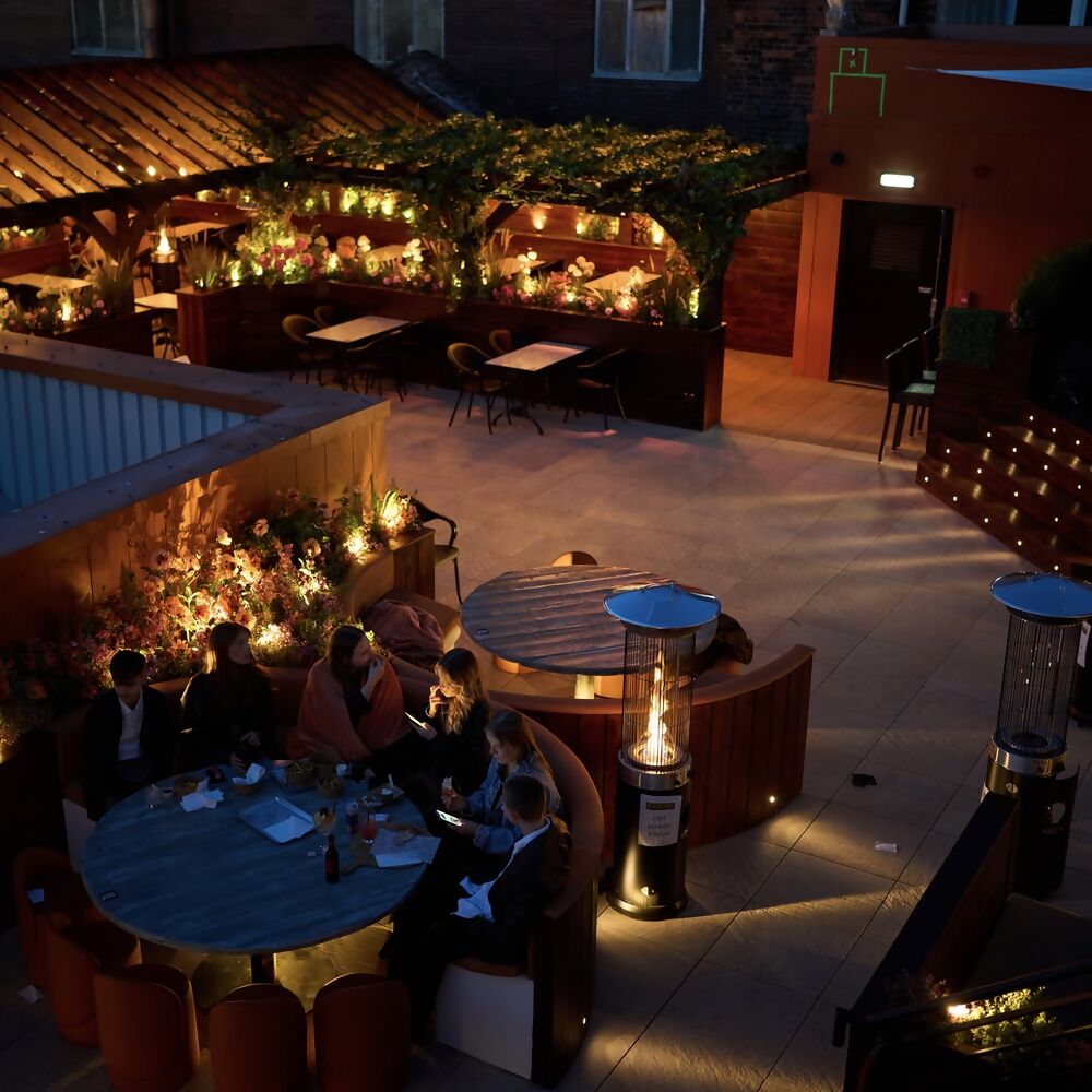 Rooftop event, greenery, networking, cocktail reception