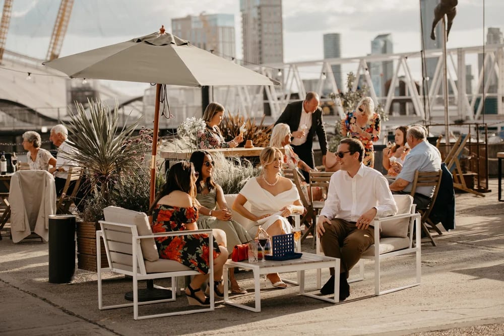 Rooftop networking, urban elegance, city views, party