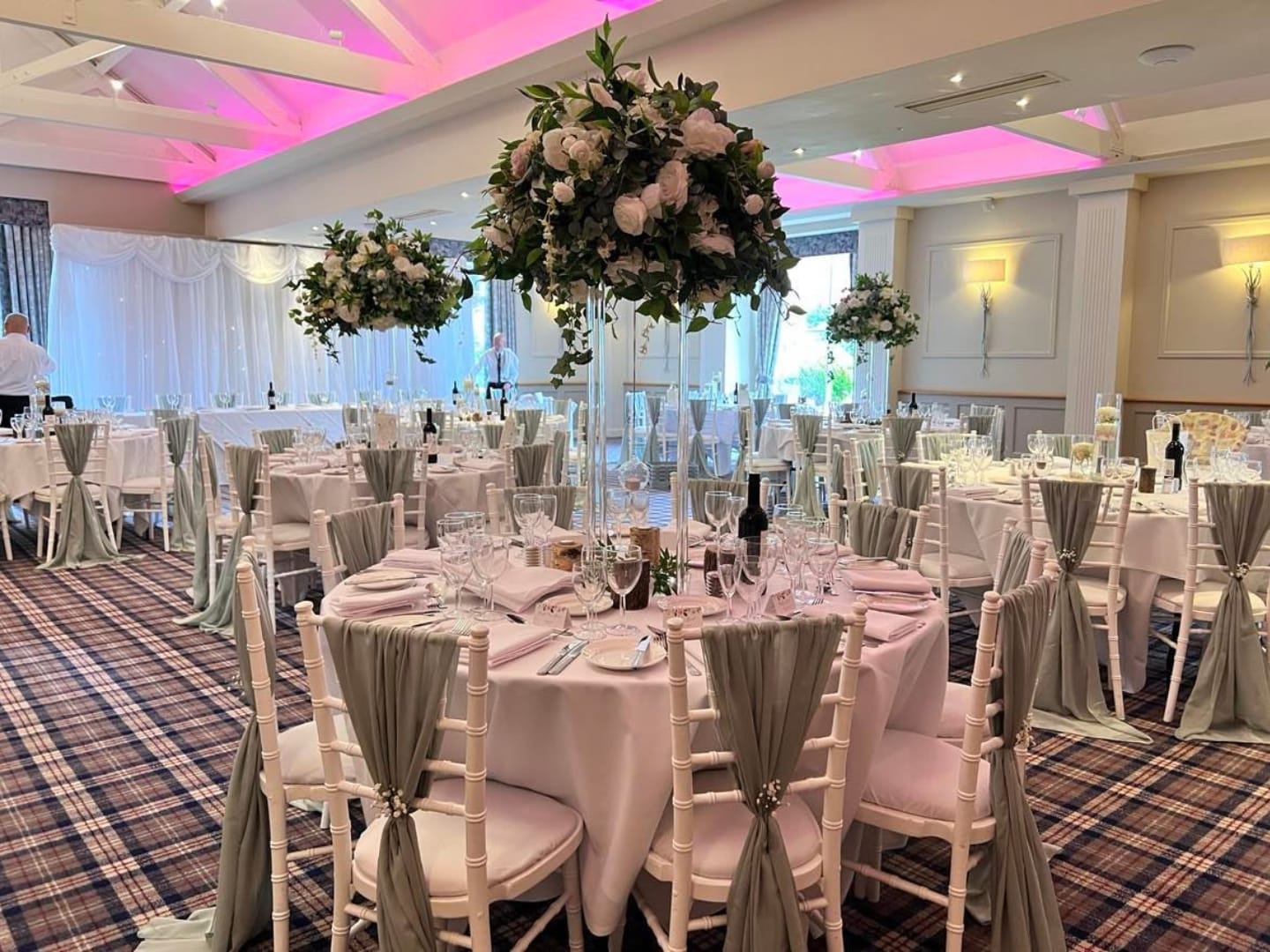 Luxury wedding venue: Carden Park Hotel, pink floral decor, romantic event