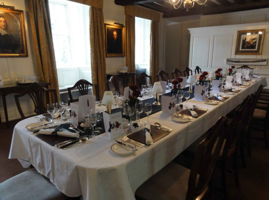 Cambridge Christ's College banquet hall portrait dinner event