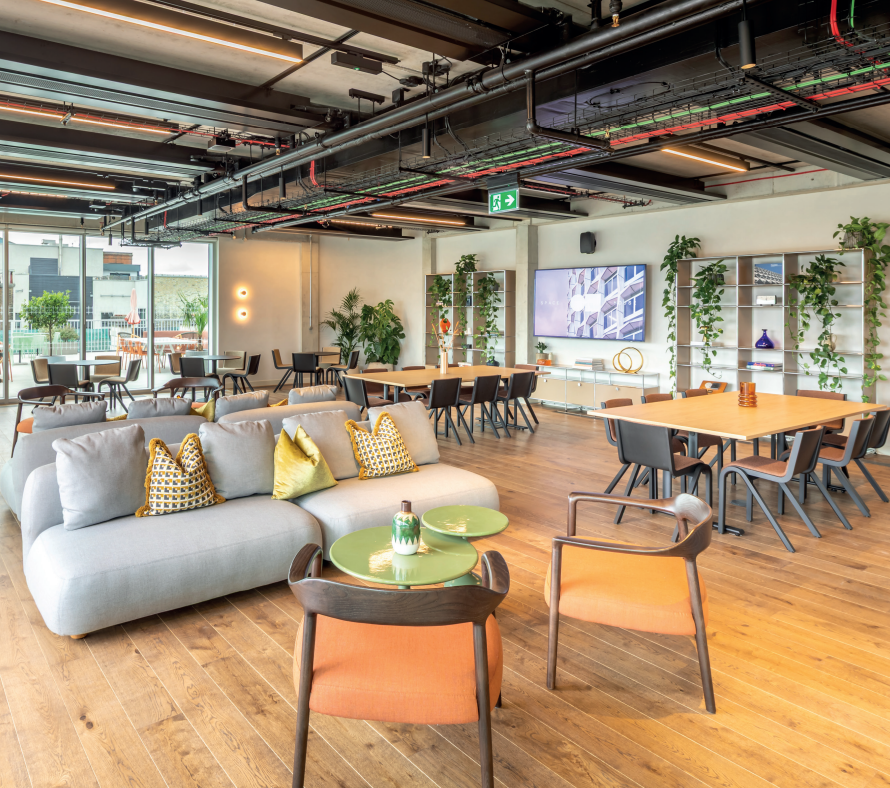 Modern event space, flexible seating, networking, brainstorming.